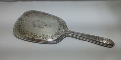 Sterling Silver Hand Mirror with Engraved Design on the Back - 12