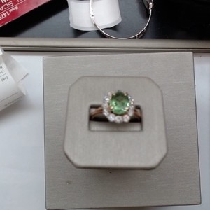  Green Oval Peridot Surrounded by a Halo of Diamonds Ring - 14kt Yellow Gold